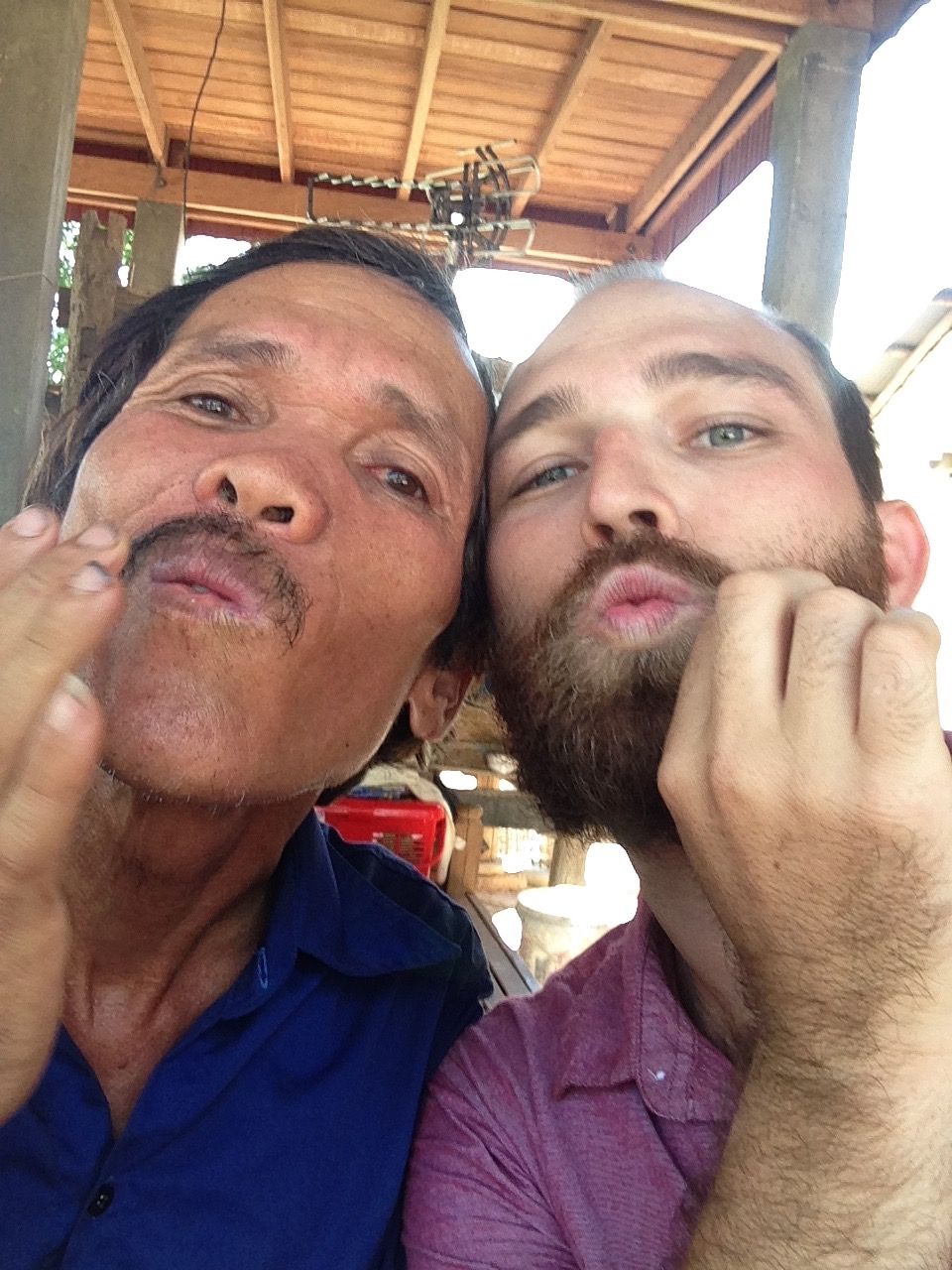 Curtis teaching English class with 40 students in Cambodia